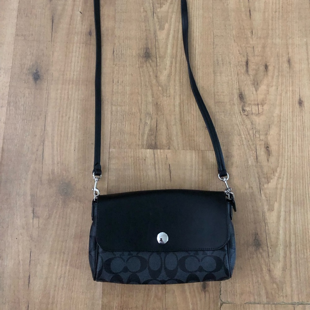 Coach black pocket book